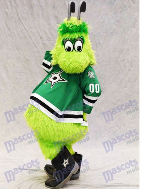 Victor E. Green of Dallas Stars Mascot Costume Furry Green Alien with Hockey Sticks 